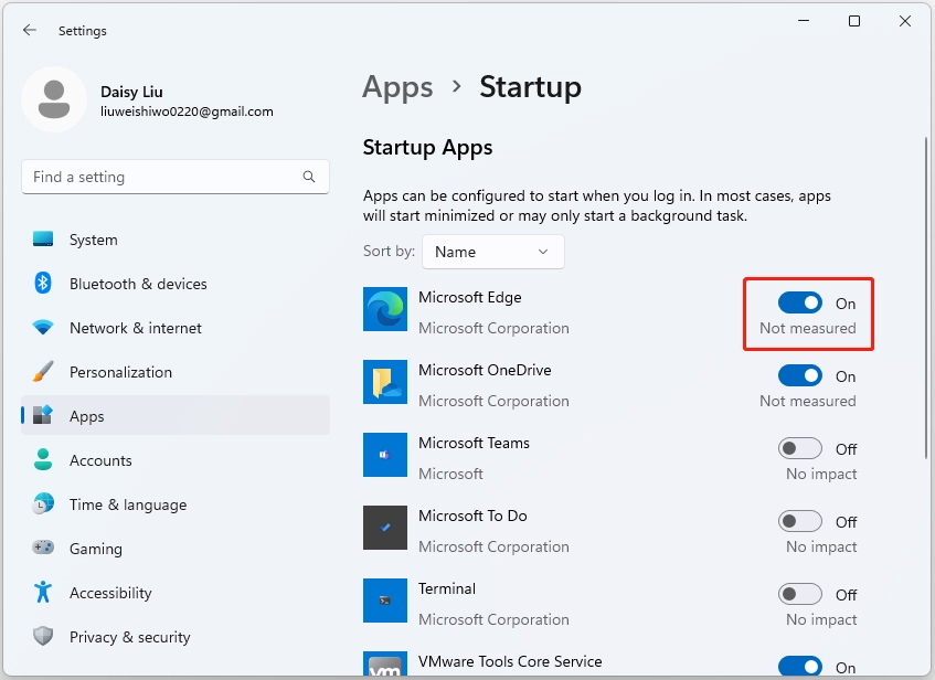 Giao diện Settings với mục Startup hiển thị danh sách ứng dụng và công tắc bật/tắt